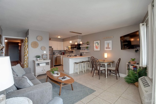 living room featuring light tile patterned floors