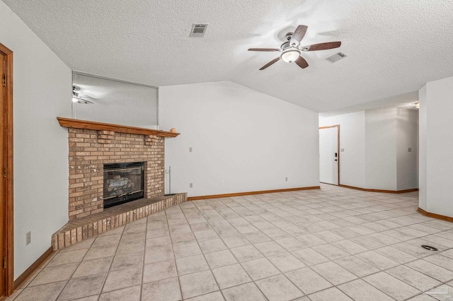 4420 Bellwood Cir, Pace, FL 32571 - unfurnished living room featuring ceiling fan, a textured ceiling, vaulted ceiling, a brick fireplace, and light tile patterned floors