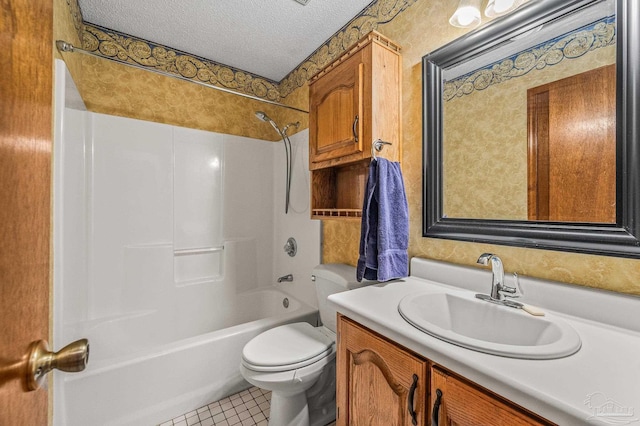 4420 Bellwood Cir, Pace, FL 32571 - bathroom with shower / washtub combination, vanity, a textured ceiling, tile patterned flooring, and wallpapered walls