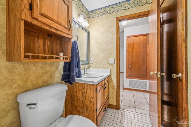 4420 Bellwood Cir, Pace, FL 32571 - bathroom with vanity, tile patterned flooring, and wallpapered walls