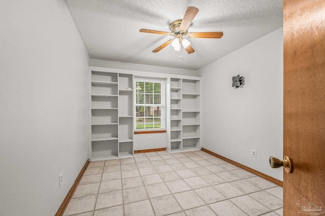 4420 Bellwood Cir, Pace, FL 32571 - empty room with a textured ceiling, ceiling fan, and light tile patterned floors