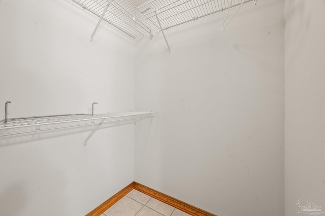 4420 Bellwood Cir, Pace, FL 32571 - walk in closet with light tile patterned flooring