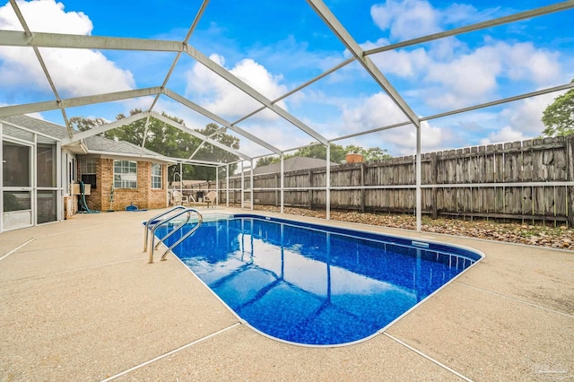 4420 Bellwood Cir, Pace, FL 32571 - view of swimming pool featuring a fenced backyard, a patio, and glass enclosure