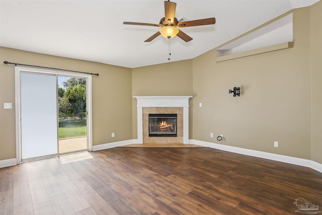 5833 Pebble Ridge Dr, Milton, FL 32583 - unfurnished living room with ceiling fan, lofted ceiling, wood finished floors, and a fireplace