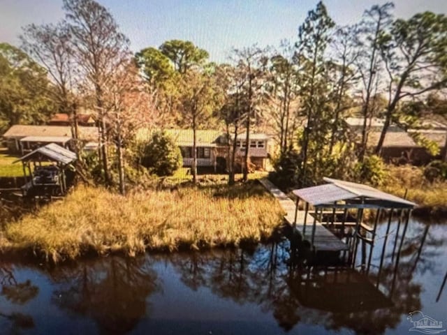 dock area with a water view