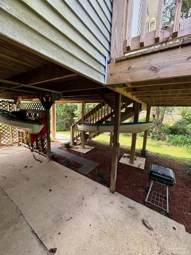 view of home's community with a patio area