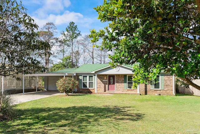 ranch-style home with a front yard and a garage