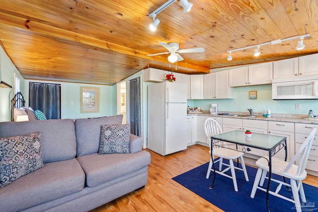 kitchen featuring white appliances, white cabinets, wooden ceiling, and light hardwood / wood-style flooring