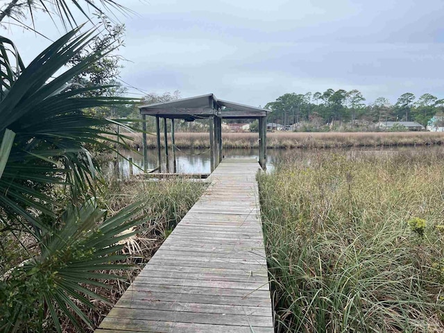 view of dock with a water view