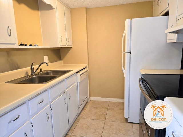 kitchen featuring dishwasher, a textured ceiling, white cabinetry, a sink, and light tile patterned flooring