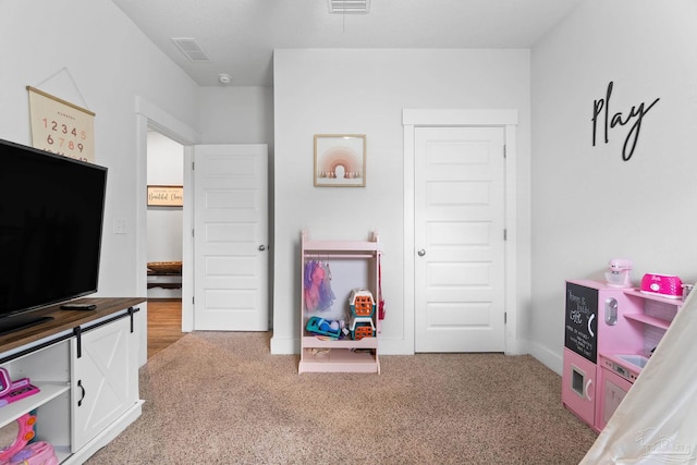 5722 Conley Ct, Pace, FL 32571 - rec room featuring light colored carpet and baseboards