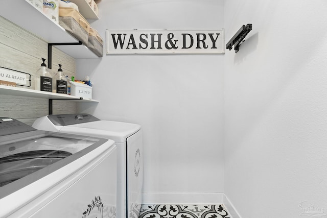 5722 Conley Ct, Pace, FL 32571 - laundry room featuring washer and dryer and baseboards