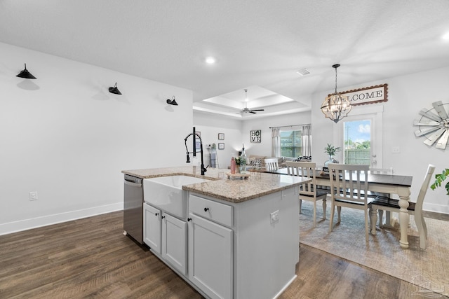 5722 Conley Ct, Pace, FL 32571 - kitchen with dishwasher, a sink, dark wood-type flooring, a raised ceiling, and recessed lighting