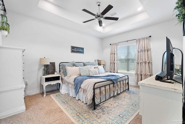 5722 Conley Ct, Pace, FL 32571 - bedroom featuring a tray ceiling, baseboards, light colored carpet, a ceiling fan, and recessed lighting