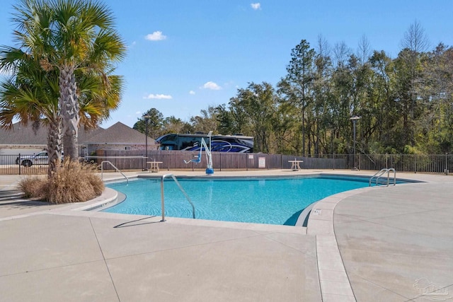 5722 Conley Ct, Pace, FL 32571 - community pool with a patio