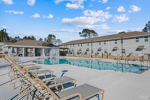 view of swimming pool featuring a patio area