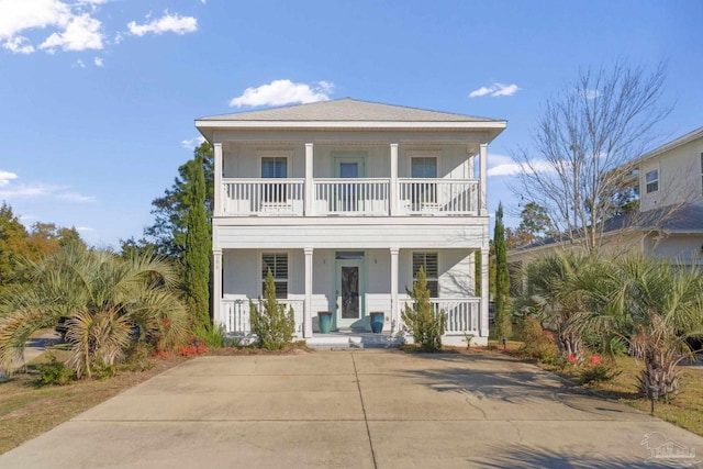 view of front of house with a balcony