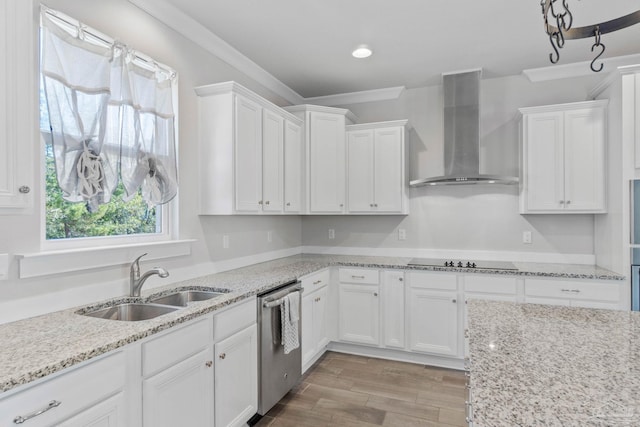 kitchen with dishwasher, sink, wall chimney exhaust hood, black electric cooktop, and white cabinetry