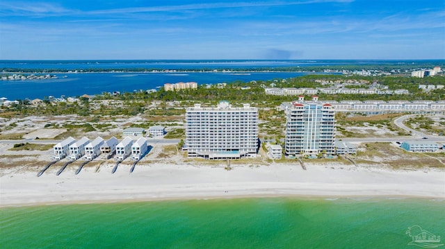 drone / aerial view with a view of the beach, a water view, and a view of city