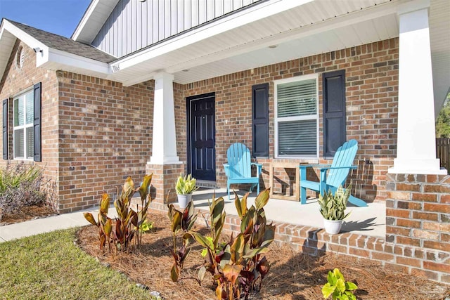 property entrance with covered porch