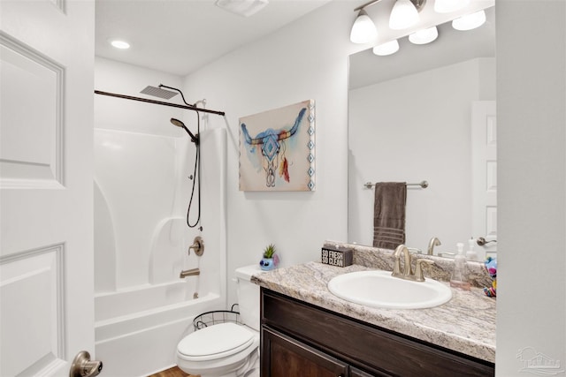 full bathroom featuring bathtub / shower combination, vanity, and toilet