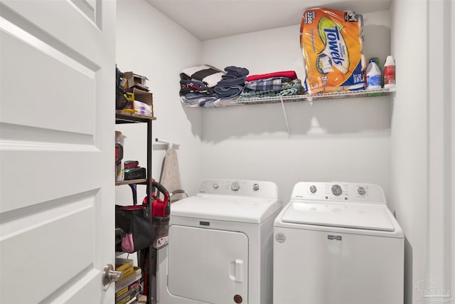 laundry room with washing machine and dryer