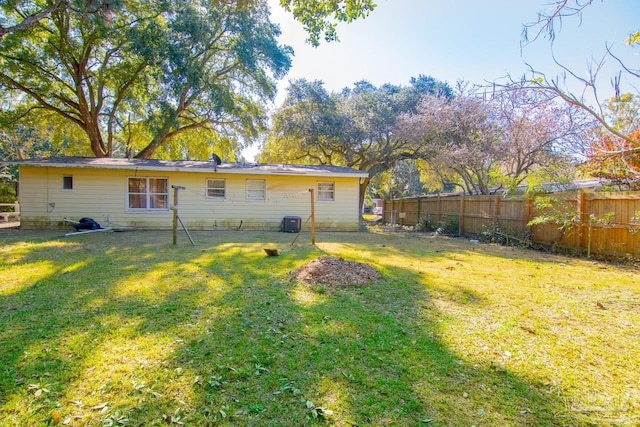 view of yard with central AC unit