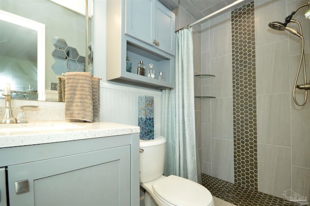 5845 Keystone Rd, Pensacola, FL 32504 - full bathroom featuring toilet, vanity, and tiled shower