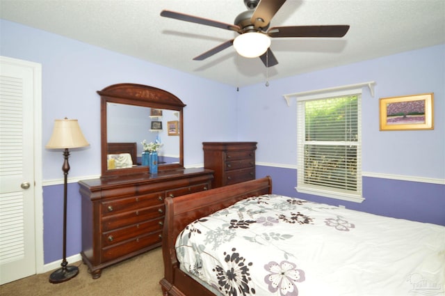 5845 Keystone Rd, Pensacola, FL 32504 - bedroom with carpet floors, a ceiling fan, and baseboards