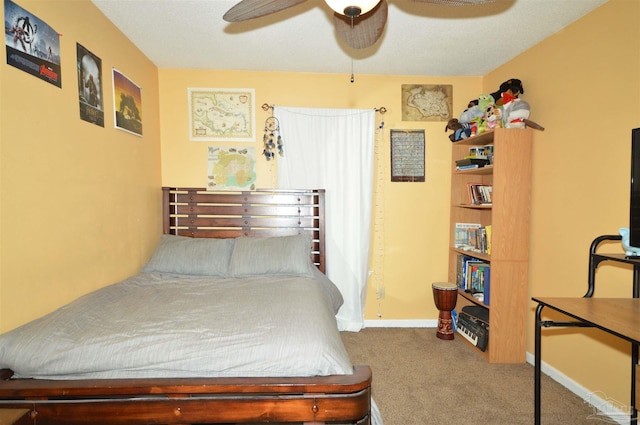 5845 Keystone Rd, Pensacola, FL 32504 - bedroom with carpet flooring, a ceiling fan, and baseboards