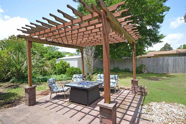 5845 Keystone Rd, Pensacola, FL 32504 - view of patio / terrace featuring a fire pit and a pergola