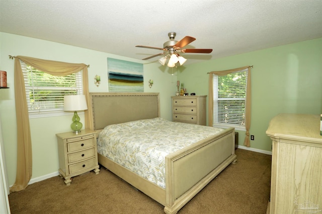 5845 Keystone Rd, Pensacola, FL 32504 - carpeted bedroom featuring baseboards and a ceiling fan