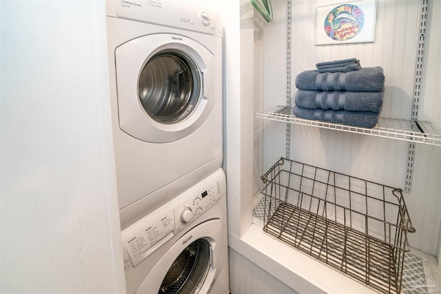 washroom with stacked washer / dryer