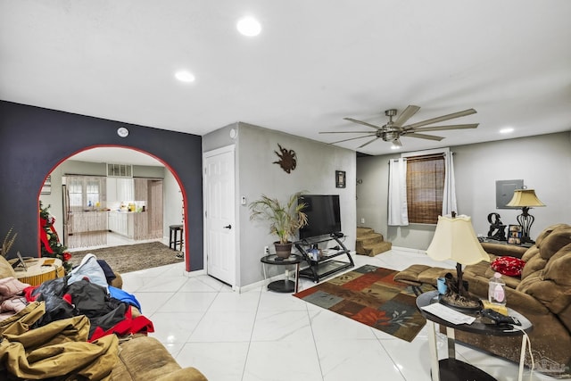 living room with ceiling fan