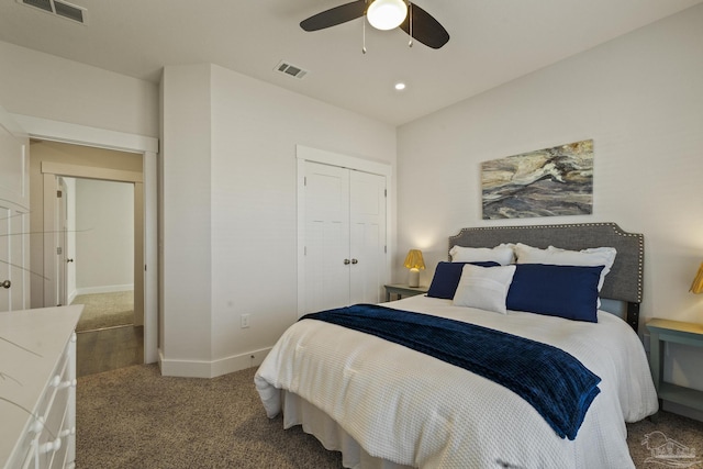 carpeted bedroom featuring a closet and ceiling fan