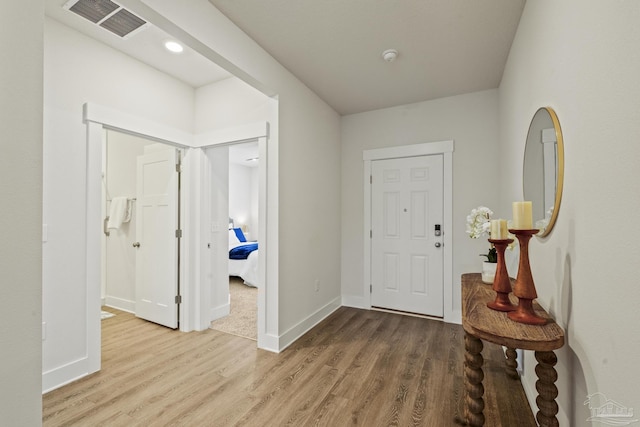 foyer with hardwood / wood-style flooring