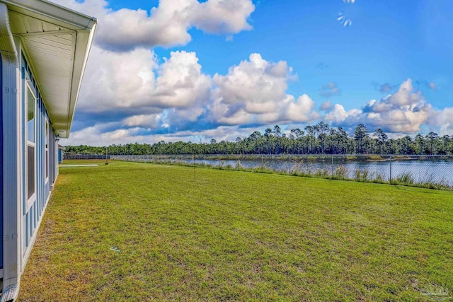 view of yard with a water view