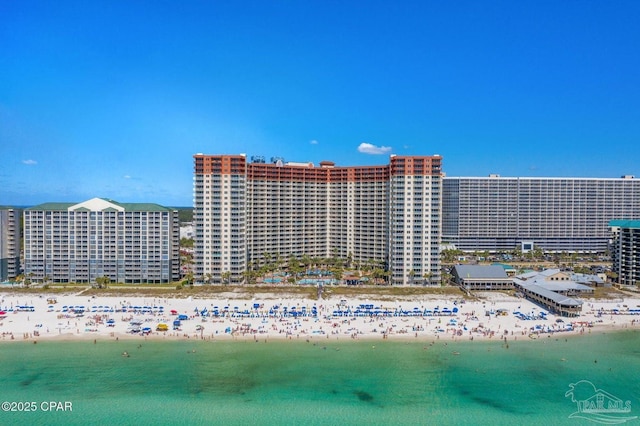 aerial view with a beach view, a city view, and a water view