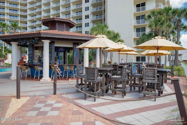 view of patio featuring a gazebo and an outdoor bar