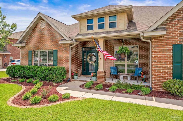 9521 Pebble Stone Dr, Pensacola, FL 32526 - view of front of house featuring brick siding and a shingled roof