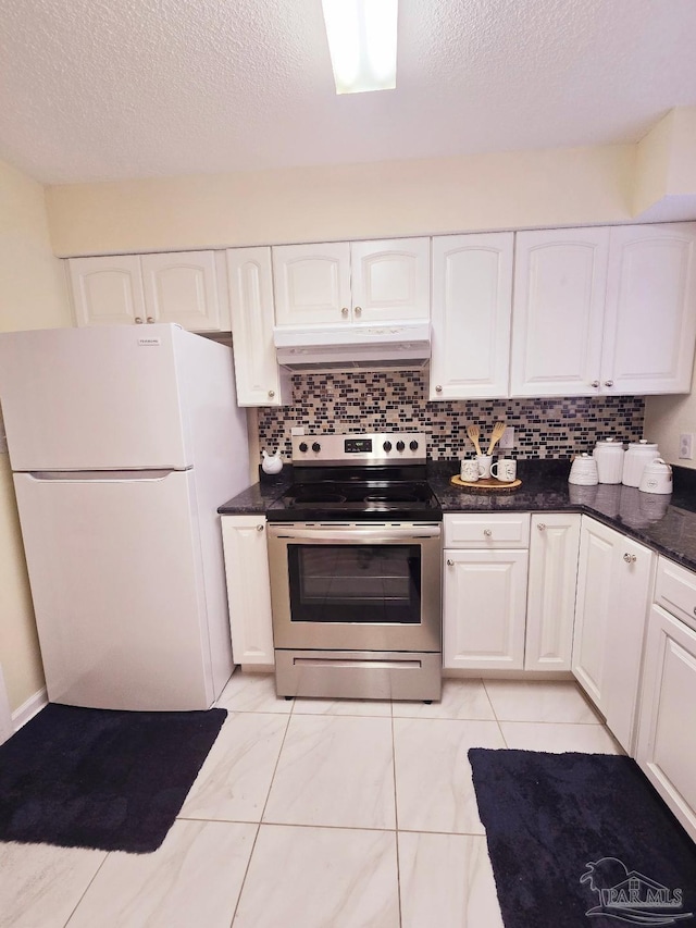 kitchen featuring freestanding refrigerator, white cabinets, stainless steel electric range oven, and range hood