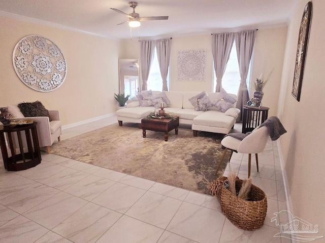 living room featuring baseboards, marble finish floor, a ceiling fan, and crown molding