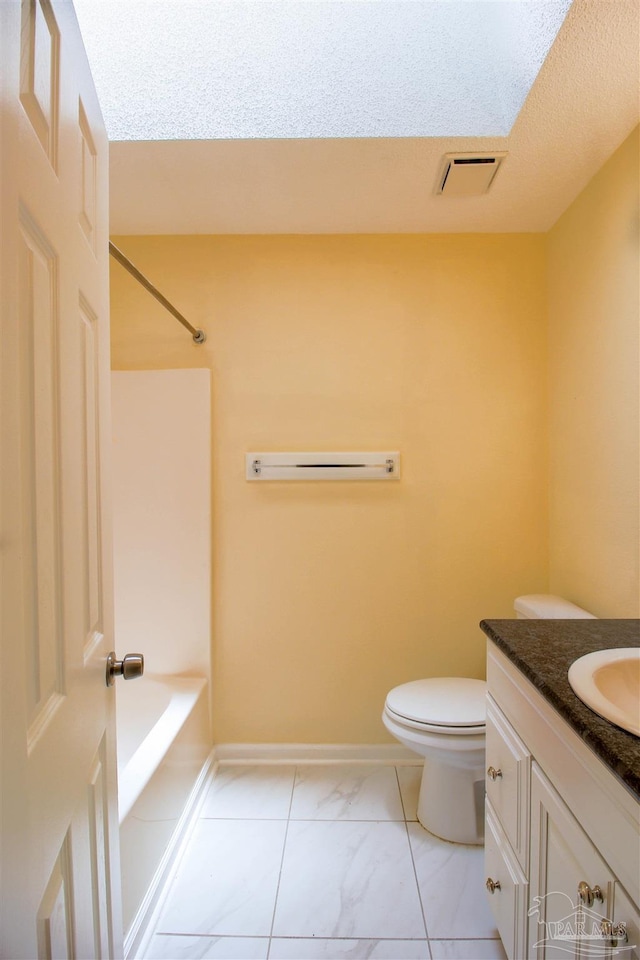 bathroom featuring visible vents, toilet, vanity,  shower combination, and baseboards