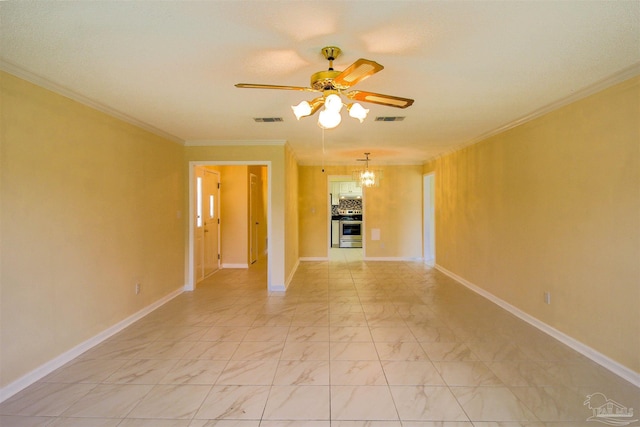 unfurnished living room with marble finish floor, a ceiling fan, visible vents, and crown molding