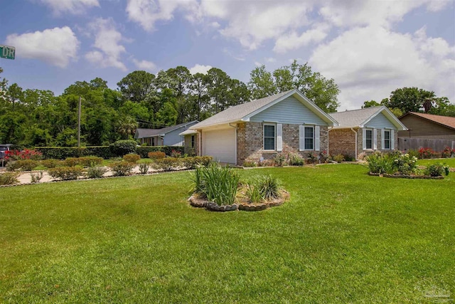 view of front of home featuring brick siding, a front lawn, and an attached garage