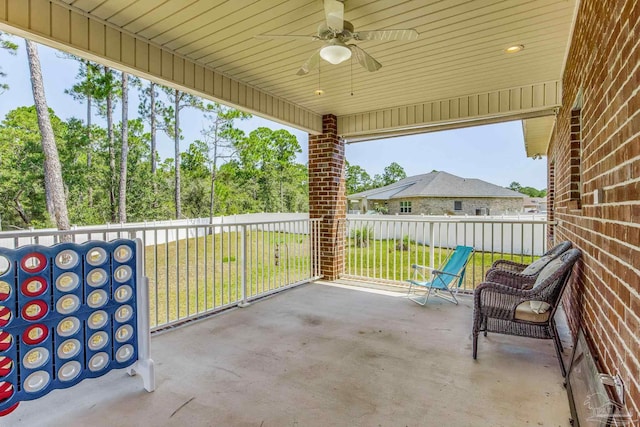 view of patio with ceiling fan