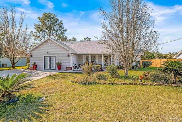 ranch-style house with a front lawn