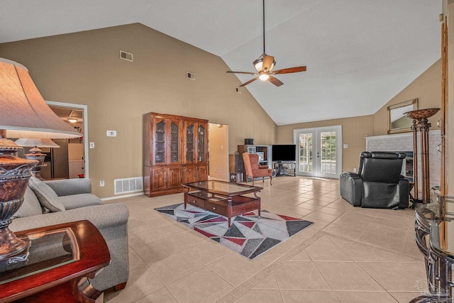 living room featuring ceiling fan, high vaulted ceiling, french doors, and light tile patterned flooring