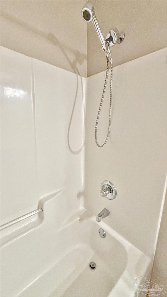 full bath featuring shower / washtub combination