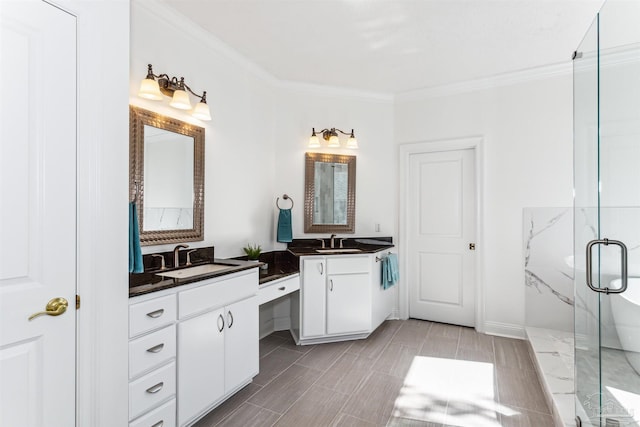 bathroom featuring vanity, an enclosed shower, and ornamental molding